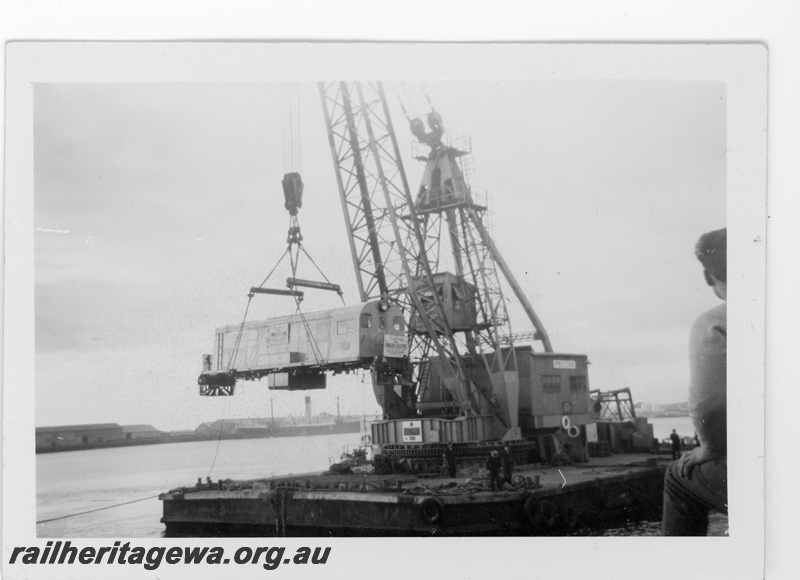 P16126
3 of 6 images of an MRWA F class diesel being unloaded from a ship by the floating crane 