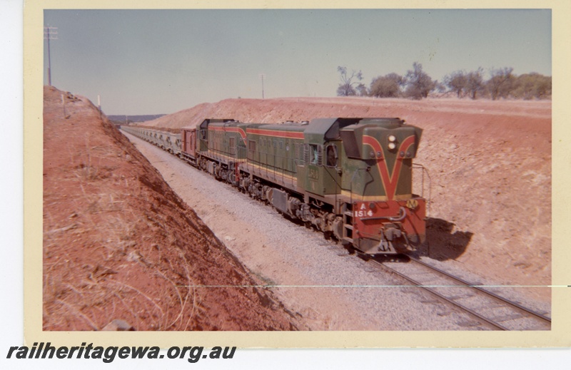 P16132
A class 1514, A class 1513, iron ore train, in a cutting out of Morawa, NR line, view along the train 
