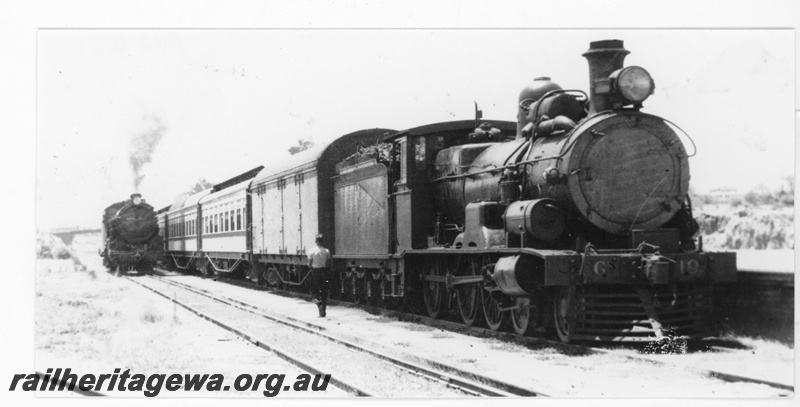 P16460
Commonwealth Railways (CR) G class 19, on passenger train, C class loco, Karonie, TAR line, side and front view, c1932
