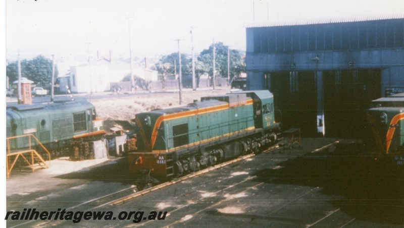 P16479
AA class 1515, AA class1516, in green with red and yellow stripe, X class diesel, diesel shed, East Perth loco depot 

