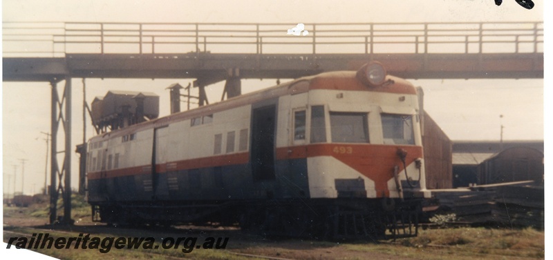 P16557
ADF class Wildflower railcar 493, in red, white and green livery, Bunbury, SWR line, front and side view
