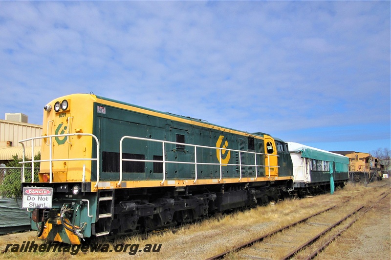 P16619
1 of 3 images of PTA U class 201, in Coote Industries livery, Bassendean loop, end and side view, long end to camera
