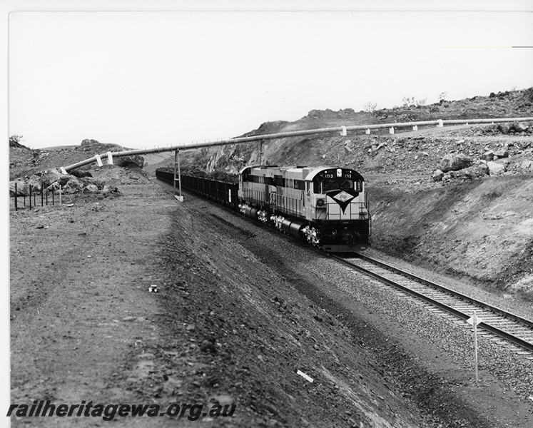 P16739
Cliffs Robe River (CRRIA) M636 class 1713, 1711 haul first train on CRRIA railway near Cooya Pooya. The tree branch in first wagon commemorates first load of ore from new mine.

