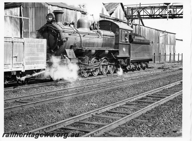P17648
FS class 451 steam locomotive shunting at East Perth. ER line. Note rear of building wall next to rail line and portion of signal gantry.
