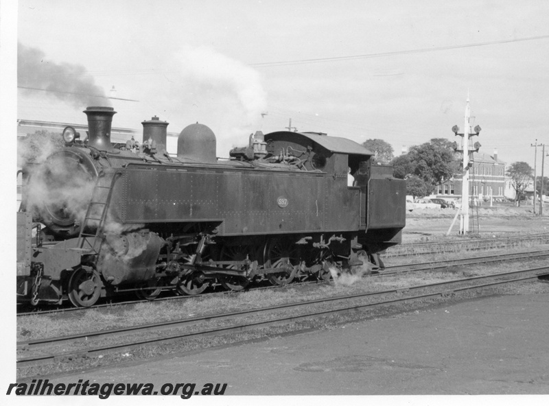 P17657
DD class 597 steam locomotive at Midland. ER line. Note the shunting dolly forward of the locomotive. The C.M.Es building is behind the signal post.
