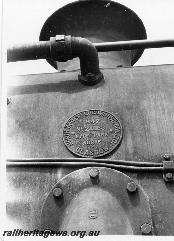 P17660
U class 655 oil burning steam locomotive's builders plate on side of smokebox. Location Unknown.
