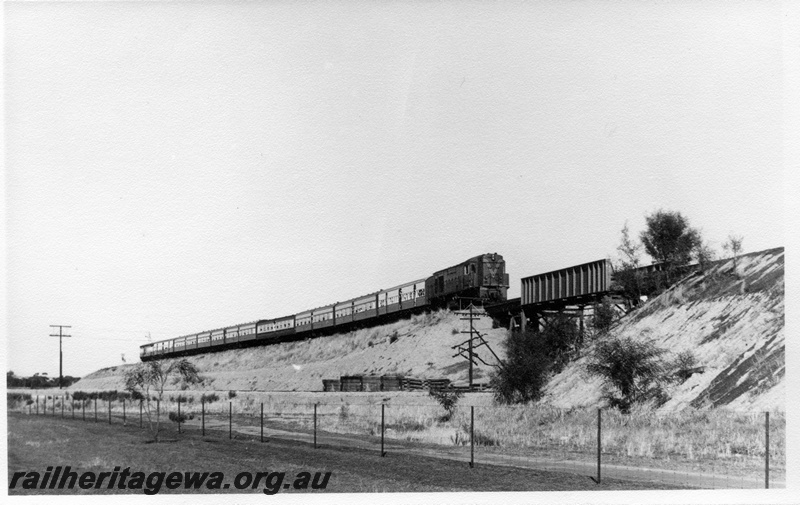 P17787
R class 1903, on ARHS tour train to Meckering, approaching steel bridge along embankment, EGR line, in middle distance
