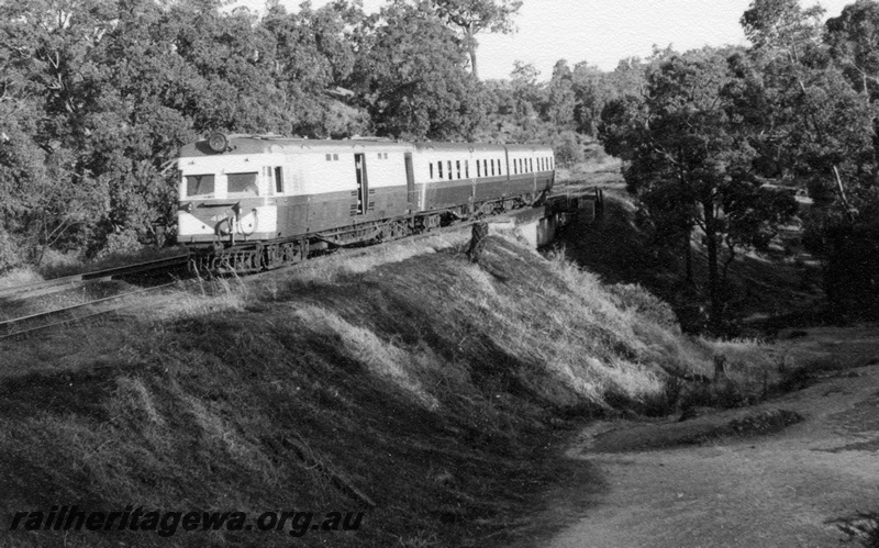 P17804
ADF class railcar, with two ADU class trailers, on small bridge in the forest, National Park, ER line
