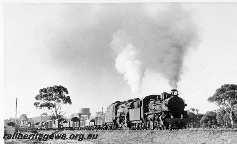 P17850
PM class 714 and V class 1223 steam locomotives at Brookton. GSR line. Note the two water towers in the background.
