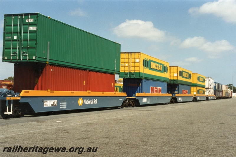 P18005
2 of 3 double stacked container wagons, five RQYZ7064L class container wagons, permanently coupled together, Kewdale yard, end and side view
