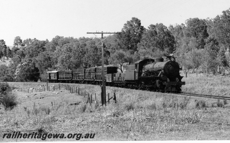 P18603
W class 942, on Pinjarra to Dwellingup goods train comprising wagons loaded with timber and van, PN line
