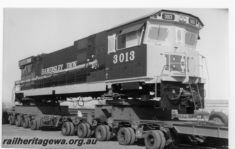 P18842
Hamersley Iron (HI) C636R 3013 on low loader at Comeng Bassendean works ready for transport to Dampier. Rebuilt with Pilbara cab.
