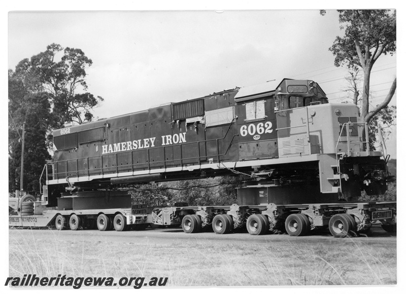 P18845
Hamersley iron (HI) SD50 class 6062 on low loader enroute from Forrestfield to Dampier. 
