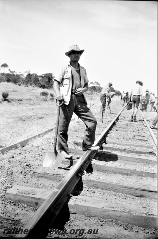 P19507
2 of 6 images of rail maintenance crew on EGR line, manual tools, note lack of special work clothes
