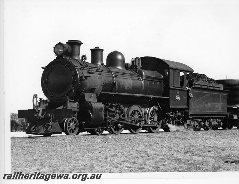 P20081
E class 299, on train laden with water tanks, Karalee, EGR line, front and side view
