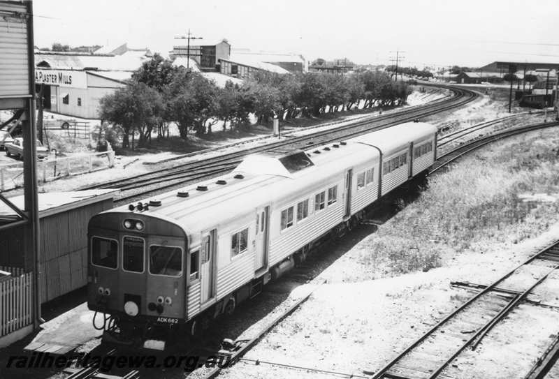 P21622
ADK class 682, on 2 car DMU set bound for Armadale, leaving Claisebrook station, SWR line, end and side view from elevated position, 
