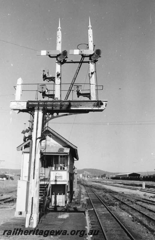 P21643
Bracket signals, signal Box B, tracks, wagons, shed, Midland, ER line, looking east 
