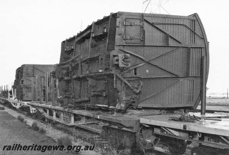 P21732
DC class wagon damaged on flat wagon, West Merredin. EGR line
