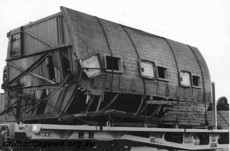 P21736
DC wagon damaged being transported on QUA class wagon 25186 at West Merredin. EGR line. 
