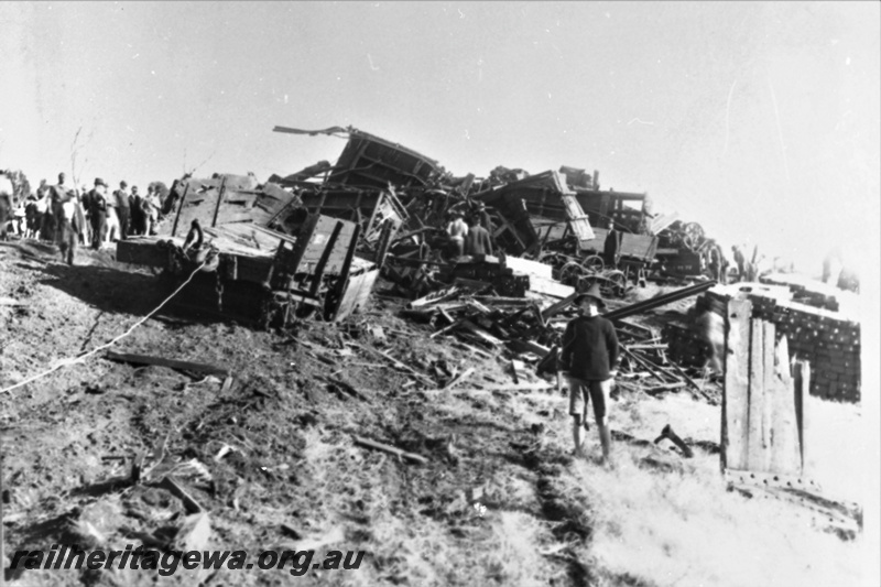 P23019
Mornington Mills disaster at Wokalup 2 of 2, debris of wagons, workers, onlookers, bush setting, Wokalup, SWR line, incident occurred on 6 November 1920
