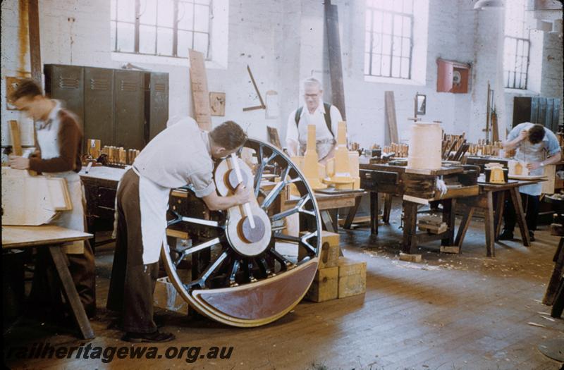 T00242
Pattern Shop, Midland Workshops, tradesman working on a pattern for a loco driving wheel with bifurcated spokes
