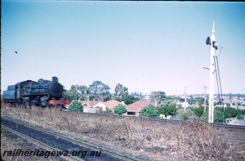 T01104
PMR class, side and front view, signal, Mount Lawley. (loco out of focus)
