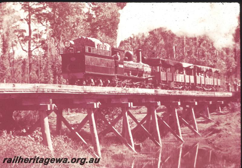 T01354
SSM G class, trestle bridge, tour train with open wagons with canopies. Same as T0597
