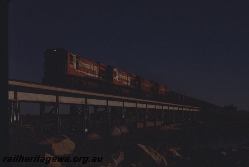 T01665
Mount Newman Mining locos on bridge, iron ore train, C36-7M class 5507.
