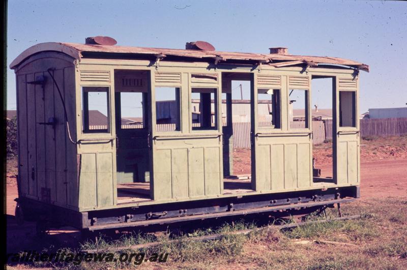 T03235
Ex WAGR AI class 4 wheeled carriage, dilapidated state, end and side view, Carnarvon
