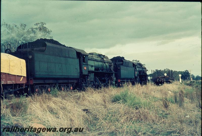 T03304
Double headed V classes, goods train, view from rear looking forward, wagon with a yellow tarpaulin
