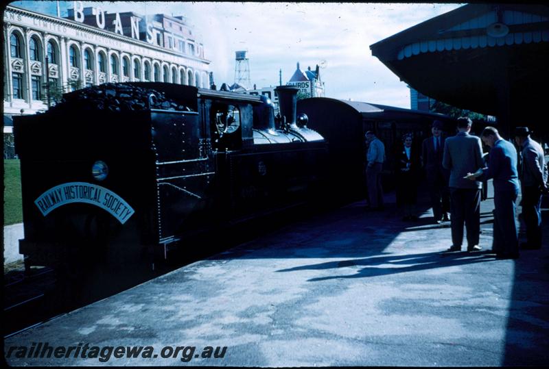 T03339
N class 200, 4-4-4T steam locomotive, Armadale dock, Perth Station, Boans store in background, about to depart with an ARHS tour train to Armadale
