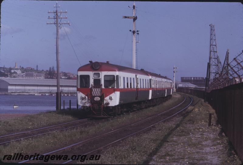 T04199
ADA class, ADG class railcar set, distant signal, North Fremantle, about to cross the North Fremantle Bridge heading towards Fremantle
