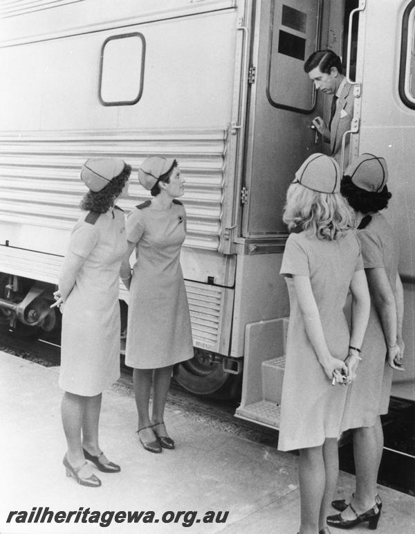 P00256
Prince Charles alighting from a Prospector railcar with a guard of honour of four Westrail hostesses
