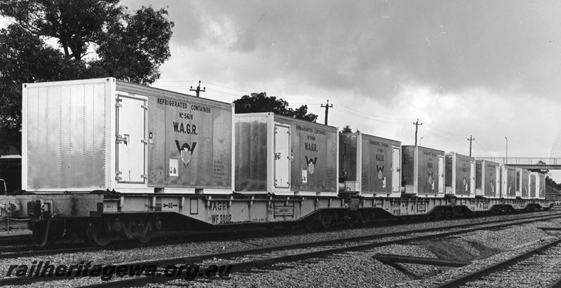 P00487
W class 30112 standard gauge flat wagon, (later reclassified to WFDY), with 