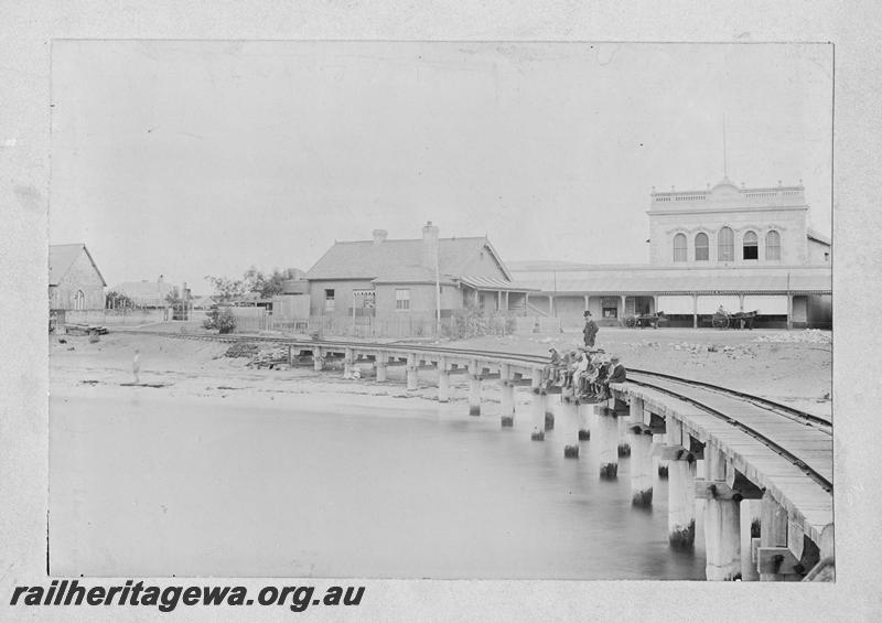 P00518
Old Geraldton station, erected in 1882, line to the jetty in the foreground.
