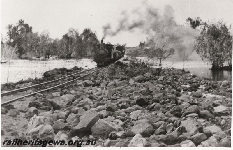 P00587
Train hauled by a G class crossing a river on the Port Hedland to Marble Bar Railway, PM line
