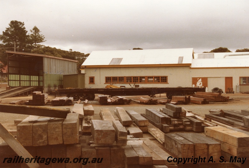 P01389
CCE depot, Narrogin, GSR line, view across the depot with stacks of timber in the foreground.
