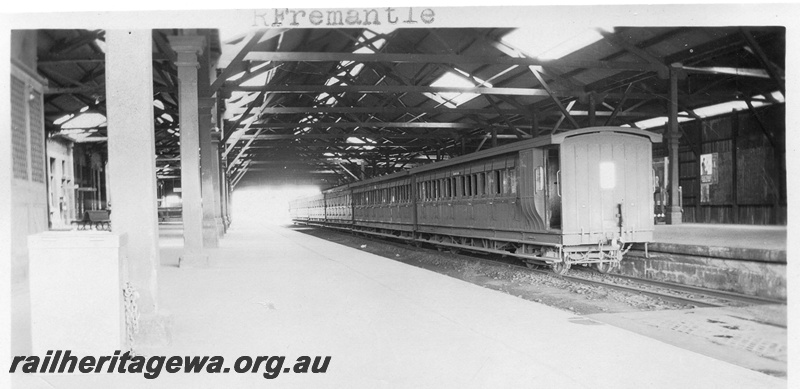 P01628
AD class carriage and other suburban carriages, under the overall roof, Fremantle station, c1926

