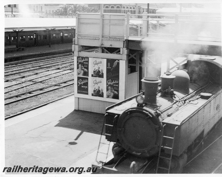P01730
DD class loco, front and side elevated view, Perth station, east end, footbridge, ER line.
