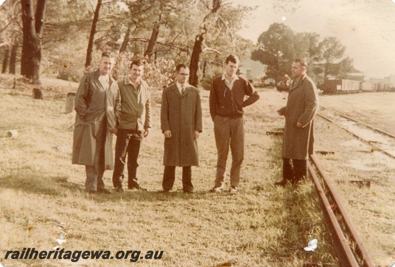 P01877
ARHS members', E. Woodland, I. Carne, D. Tyler, Unknown member and J. Stanbridge inspect the site of the future Rail Transport Museum.
