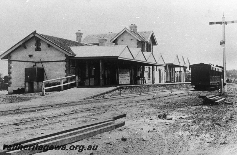 P02035
Station building, signal with double arms, carriage in the siding, Beverley, GSR line, view across the tracks looking north,c1891
