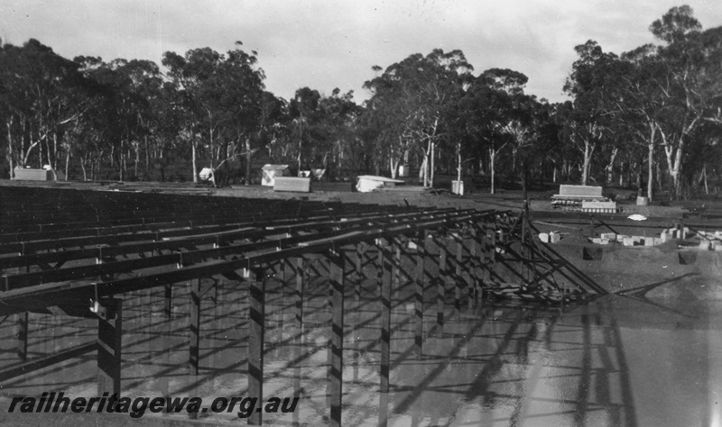P02067
3 of 12 views of the construction of a railway dam at Hillman, BN line, view of the eastern half of the roof taken from the north side of the dam.
