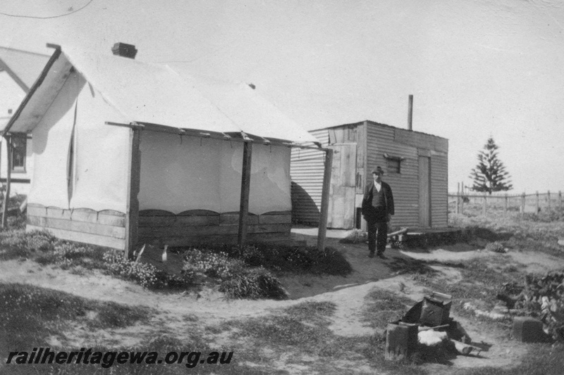 P02107
28 of 44 views of the construction of the railway at Esperance, CE line taken by Cedric Stewart, the resident WAGR engineer, worker's tent and amenities hut
