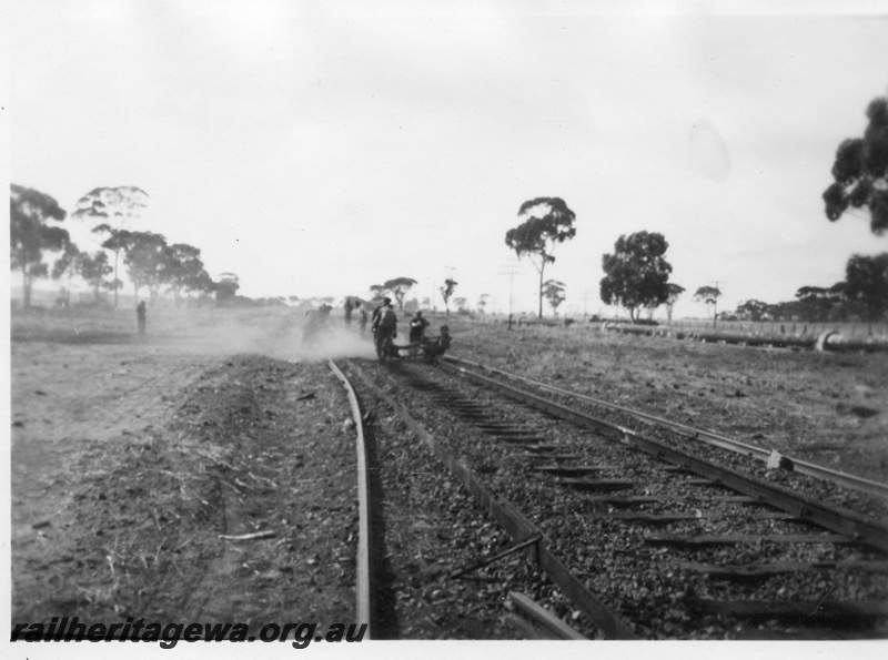 P02116
7 of 7 views of the early relaying of the track on the EGR, c1950, gangers operating a machine, view along the track
