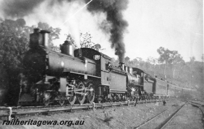 P02660
E class steam locomotive (Nasmyth Wilson and Co.) double heading E class steam locomotive (North British), Swan View, ER line, special train for turning the first sod for the Trans-Australian Railway 1913. Same as P4851
