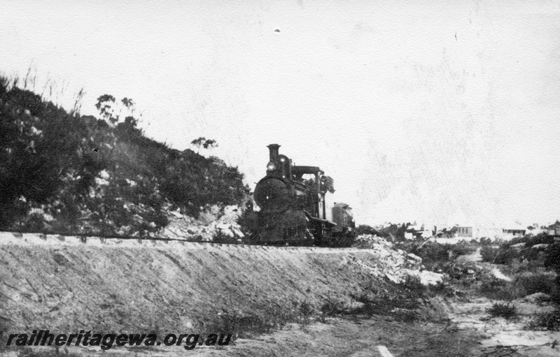 P02677
G class steam locomotive, on embankment, front view, Hopetoun - Ravensthorpe Railway.
