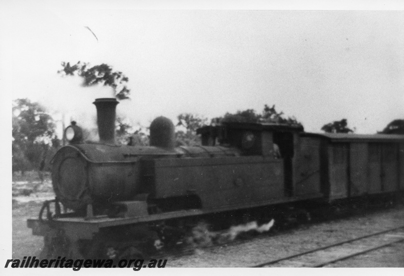 P02693
N class 72 4-4-4T steam locomotive, on goods train, front and side view, Armadale, SWR line. c1950s
