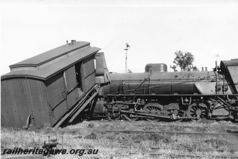 P02697
1 of 8. Rail smash, W class 951 steam locomotive, side view, derailed brakevan, Yarloop, SWR line.
