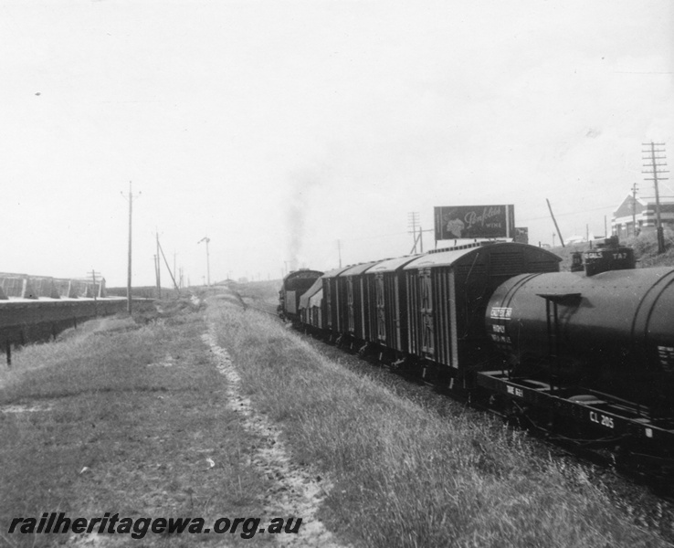 P02735
PM class 707 steam locomotive on an Up goods train, vans, open wagons, tanker, Leighton, ER line.
