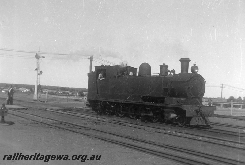 P03100
K class 37 steam locomotive, side and front view, Kalgoorlie, EGR line.
